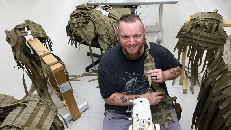 Man making military vests