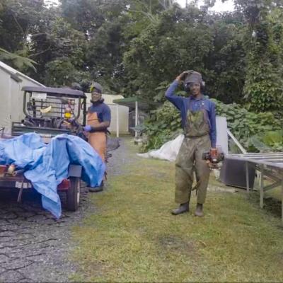 Two custodial men from The Corporate Source standing outside